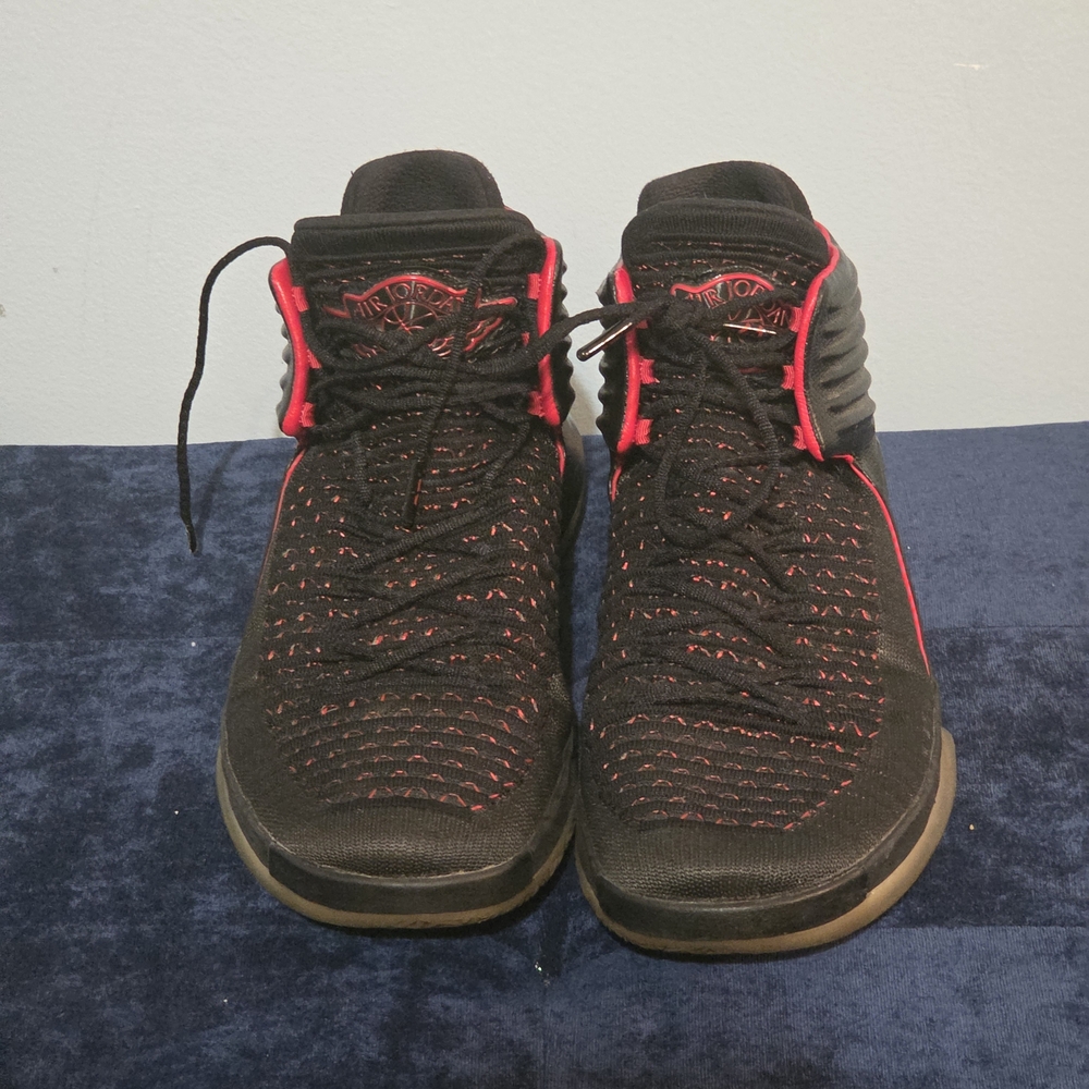 Jordan Black and Red Logo Sneakers